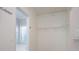 Walk-in closet leading to a bathroom with a soaking tub at 2752 Nautical Way, Villa Rica, GA 30180