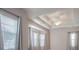Bright bedroom featuring large windows and ceiling fan at 2752 Nautical Way, Villa Rica, GA 30180