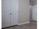 Bedroom featuring natural light, neutral paint, wood-look floors and closet access at 2752 Nautical Way, Villa Rica, GA 30180