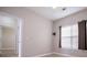 Bedroom features natural light, neutral paint, wood-look floors and closet access at 2752 Nautical Way, Villa Rica, GA 30180