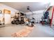 Spacious garage with golf cart, overhead lighting, and lots of space for hobbies at 2752 Nautical Way, Villa Rica, GA 30180