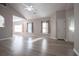 Spacious open-plan living room with vaulted ceilings, hardwood floors, and natural light at 2752 Nautical Way, Villa Rica, GA 30180