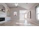 Bright living room with vaulted ceilings, hardwood floors, fireplace, and built-in cabinets at 2752 Nautical Way, Villa Rica, GA 30180