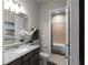 Bathroom featuring a sink, a granite countertop, and a toilet at 4800 Gablestone Xing, Hoschton, GA 30548