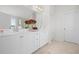 Elegant bathroom with double vanity, white cabinets, and a bright, clean design at 7161 Gladstone Cir, Lithonia, GA 30038