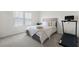 Cozy bedroom with soft natural light, carpet flooring, and a serene atmosphere at 7161 Gladstone Cir, Lithonia, GA 30038