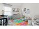 Bright and cheerful Bedroom with colorful decor, a crib, a changing table, and playful accents for a cozy space at 7161 Gladstone Cir, Lithonia, GA 30038