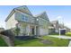 Well-maintained two-story home with a manicured lawn, and an inviting front porch, exuding suburban charm at 7161 Gladstone Cir, Lithonia, GA 30038