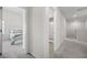 Upstairs hallway showing doorways to bedroom and bathroom at 7161 Gladstone Cir, Lithonia, GA 30038