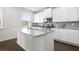 Kitchen with stainless steel appliances, granite counters, and tile backsplash at 7161 Gladstone Cir, Lithonia, GA 30038