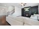 Living room featuring fireplace, comfortable seating, and staircase at 7161 Gladstone Cir, Lithonia, GA 30038
