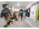 Organized walk-in closet with ample hanging space, shelving, and carpet flooring at 7161 Gladstone Cir, Lithonia, GA 30038