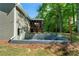 Spacious backyard with a screen porch and outdoor living area, perfect for enjoying the outdoors at 830 Lee Nw Dr, Marietta, GA 30060