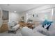 Finished basement with light wood floors, white walls, and a comfortable seating area at 830 Lee Nw Dr, Marietta, GA 30060