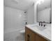 Updated bathroom with white subway tile, modern vanity, and sleek black fixtures at 830 Lee Nw Dr, Marietta, GA 30060