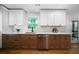Modern kitchen featuring white cabinets, stainless steel appliances, and a window at 830 Lee Nw Dr, Marietta, GA 30060