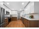 Modern kitchen features stainless steel appliances, two-tone cabinetry, and light countertops at 830 Lee Nw Dr, Marietta, GA 30060