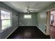 Room with hardwood floors, natural light, and a ceiling fan for comfort at 1321 Snapfinger Rd, Decatur, GA 30032