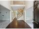 Grand foyer featuring hardwood floors, a staircase, and high ceilings creating an open and inviting space at 2650 Wendell Creek Ln, Snellville, GA 30039