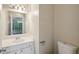 Powder room featuring a vanity with chrome fixtures and a toilet at 2650 Wendell Creek Ln, Snellville, GA 30039