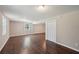 Spacious finished basement featuring dark-stained flooring and ample light at 2911 Allegro Nw Dr, Atlanta, GA 30318