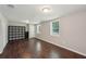 Finished basement featuring modern recessed lighting, sleek wood floors, and neutral-toned walls at 2911 Allegro Nw Dr, Atlanta, GA 30318