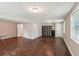 Versatile basement space with recessed lights, wood floors, and an included storage shelf at 2911 Allegro Nw Dr, Atlanta, GA 30318