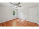 Relaxing bedroom with hardwood floors, closet, and plenty of natural light at 2911 Allegro Nw Dr, Atlanta, GA 30318