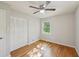 Bright bedroom featuring hardwood floors and a closet at 2911 Allegro Nw Dr, Atlanta, GA 30318