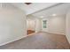 Well-lit carpeted bedroom features neutral walls and a back door at 2911 Allegro Nw Dr, Atlanta, GA 30318