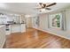 Open-concept living space with hardwood floors and great natural light at 2911 Allegro Nw Dr, Atlanta, GA 30318