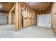 Unfinished basement with a new shower unit installed and exposed beams at 2930 Burnt Hickory Nw Rd, Marietta, GA 30064