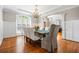 Elegant dining area featuring crown molding, a stylish light fixture and ample seating at 2930 Burnt Hickory Nw Rd, Marietta, GA 30064