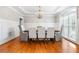 Bright dining room with wainscoting, chandelier, and ample space for hosting memorable gatherings at 2930 Burnt Hickory Nw Rd, Marietta, GA 30064