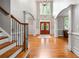 Stunning foyer with hardwood floors, staircase, and beautiful natural light creating a warm ambiance at 2930 Burnt Hickory Nw Rd, Marietta, GA 30064