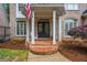 Inviting brick-lined porch with classic columns, perfect for enjoying a peaceful afternoon at 2930 Burnt Hickory Nw Rd, Marietta, GA 30064
