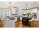 Modern kitchen with granite countertops, stainless steel appliances, and a center island at 2930 Burnt Hickory Nw Rd, Marietta, GA 30064