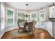 Charming breakfast nook featuring natural light, a round table and hardwood flooring at 2930 Burnt Hickory Nw Rd, Marietta, GA 30064