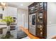 Modern kitchen with stainless steel refrigerator, granite countertops, and hardwood floors at 2930 Burnt Hickory Nw Rd, Marietta, GA 30064