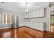 Kitchenette with new stainless steel refrigerator, updated cabinets and countertops, with wood floors at 2930 Burnt Hickory Nw Rd, Marietta, GA 30064