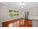Stylish kitchenette featuring modern stainless steel appliances, wood floors, and granite countertops at 2930 Burnt Hickory Nw Rd, Marietta, GA 30064
