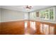 Bright living room with hardwood floors, large windows, and neutral paint for a calming atmosphere at 2930 Burnt Hickory Nw Rd, Marietta, GA 30064