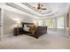 Serene main bedroom with tray ceiling, plush carpet, and views of the backyard at 2930 Burnt Hickory Nw Rd, Marietta, GA 30064