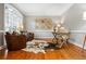 Cozy home office featuring hardwood floors, a large window, and comfortable seating at 2930 Burnt Hickory Nw Rd, Marietta, GA 30064