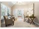 Bright home office with neutral tones, carpet flooring, and natural light from a large window and an open ensuite bathroom at 2930 Burnt Hickory Nw Rd, Marietta, GA 30064