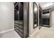 Custom walk-in closet with dark wood shelving and drawers, providing ample storage and organization space at 2930 Burnt Hickory Nw Rd, Marietta, GA 30064