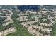 Aerial view of the community, highlighting the neighborhood's winding streets and lush greenery at 3113 Brians Creek Se Dr, Conyers, GA 30013