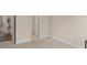 Neutral bedroom features cozy carpet and an access door at 3113 Brians Creek Se Dr, Conyers, GA 30013