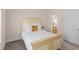 Bedroom with natural light, neutral carpet, and a stylish bed frame at 3113 Brians Creek Se Dr, Conyers, GA 30013