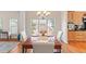 Formal dining room features hardwood floors, wainscoting, and an abundance of natural light at 3113 Brians Creek Se Dr, Conyers, GA 30013